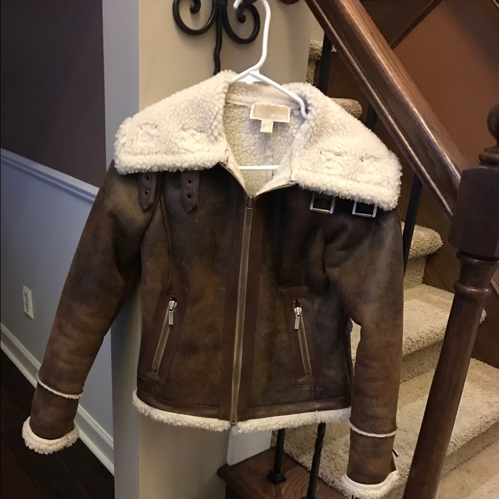 Michael Kors distressed bomber jacket.